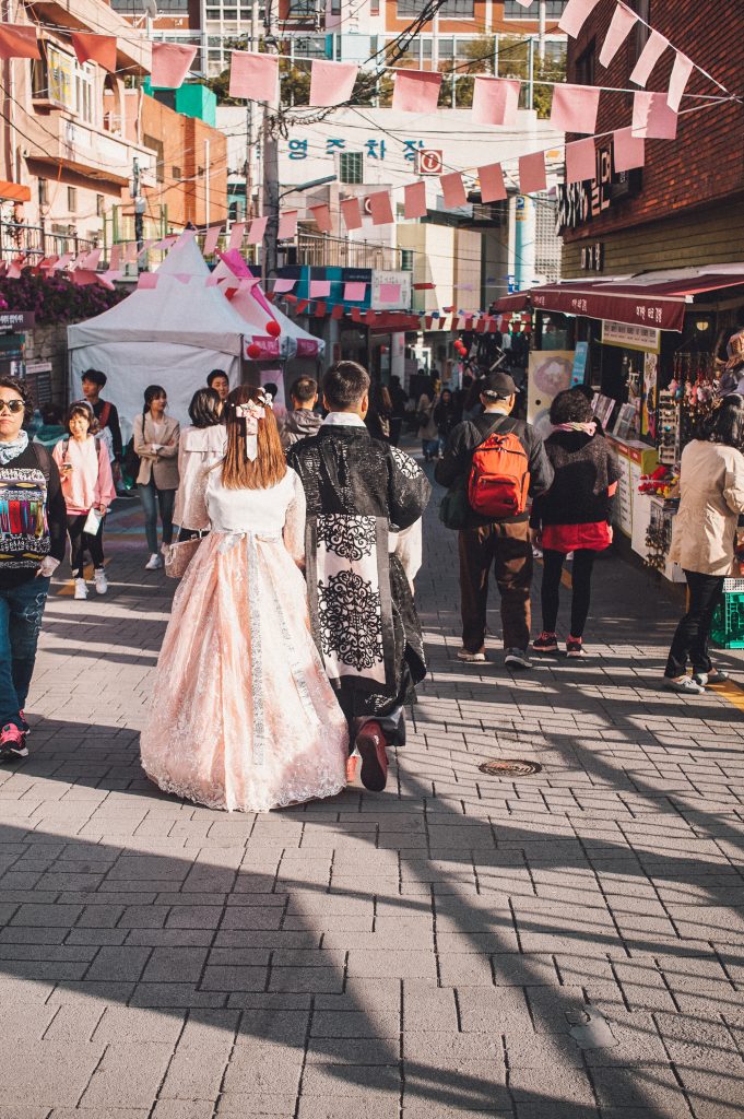 Tourists wearing traditional hanboks at Gamcheon Cultural Village