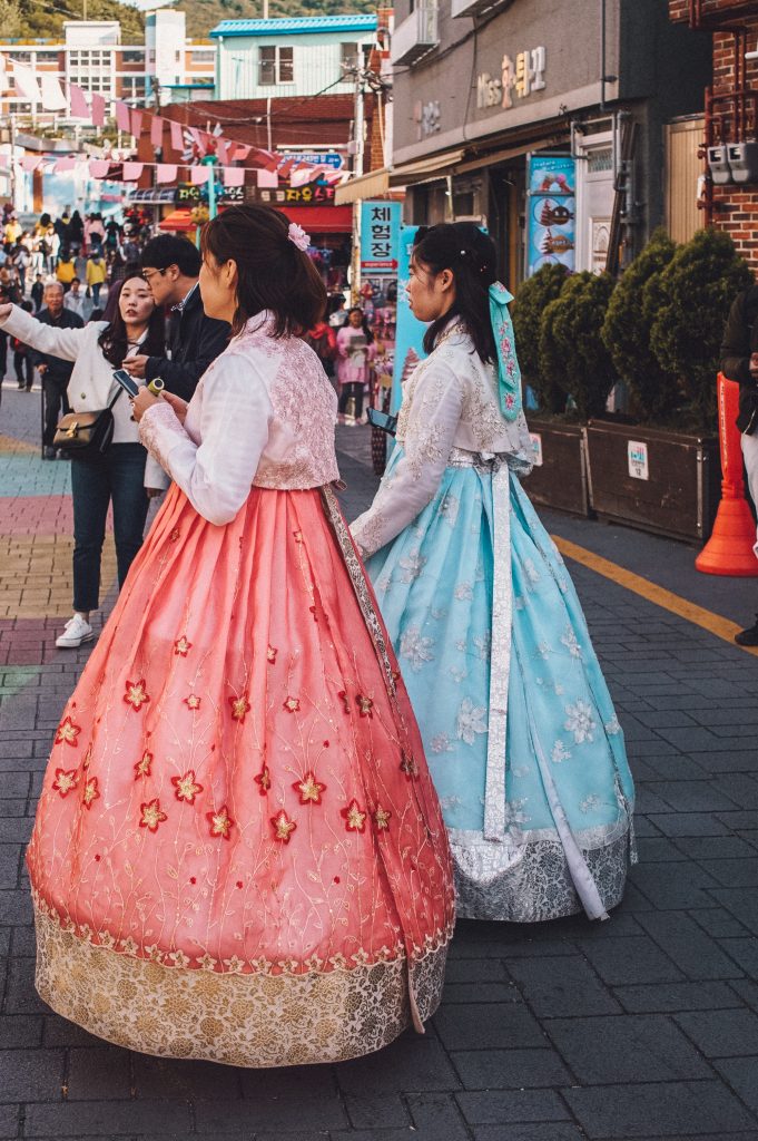 Tourists wearing traditional hanboks at Gamcheon Cultural Village